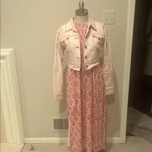 Pink Patterned Dress accessorized  with blush denim jacket (sold separately).